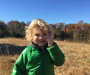 Child in a field at Washington Lake Park