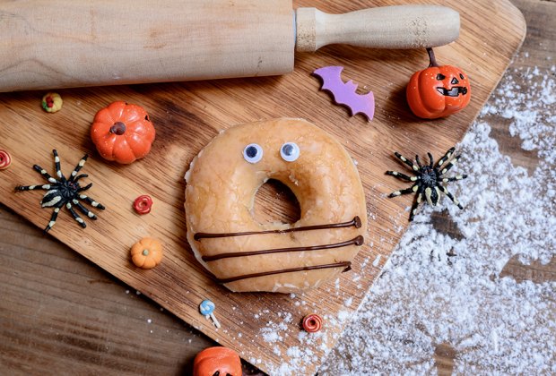 It's easy to make a spookily fun breakfast by adding eyes or creepy critters to donuts.