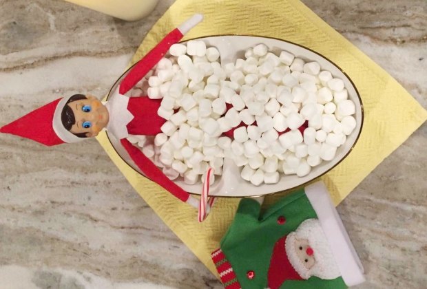 Elf on the Shelf takes a dip in a marshmallow bath