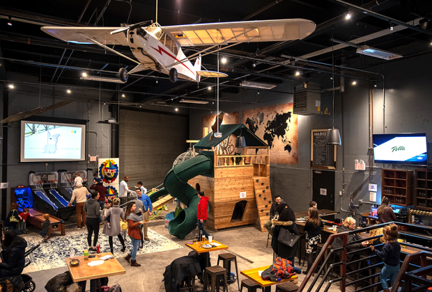 Parents eat while kids climb and slide at Craft Hall.