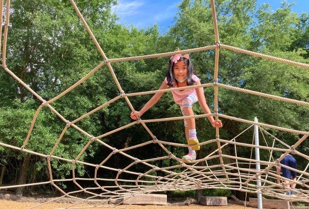 Climbing the spiderweb. Photo by Vicki Li Yip